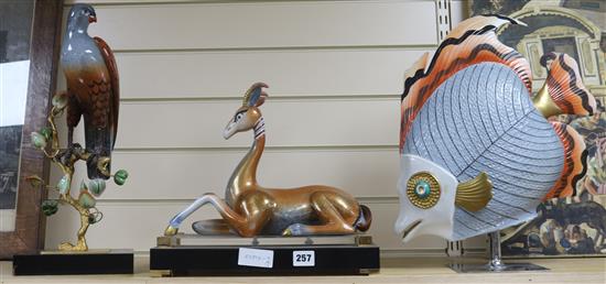 Three porcelain and metal mounted models of a bird, an antelope and a fish